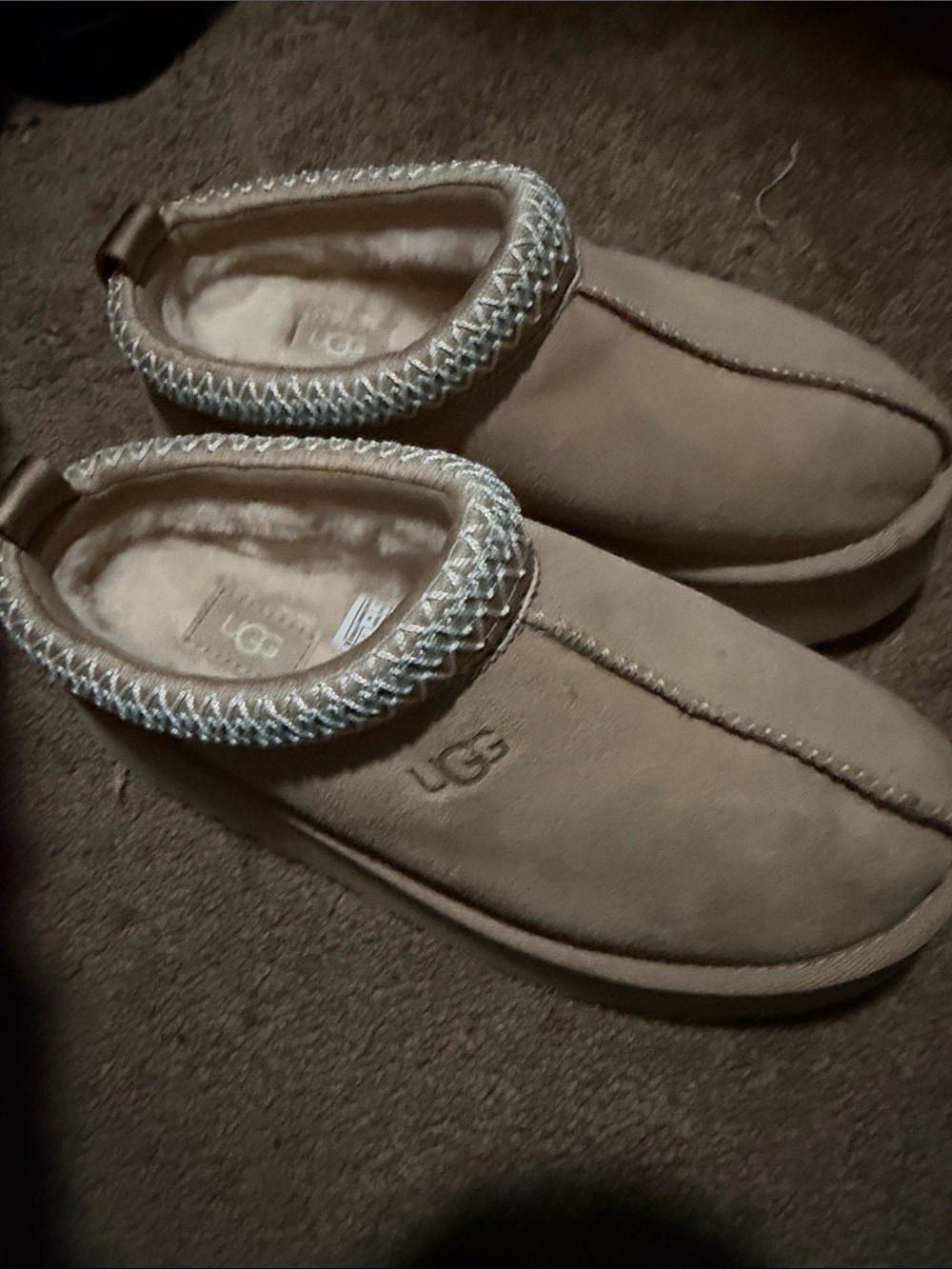 UGG women’s Slip-On Moc Slipper in Chestnut Tan
